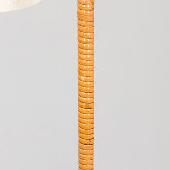 Paavo Tynell, a pair of mid-20th century K10-10 floor lamps for Taito Finland.