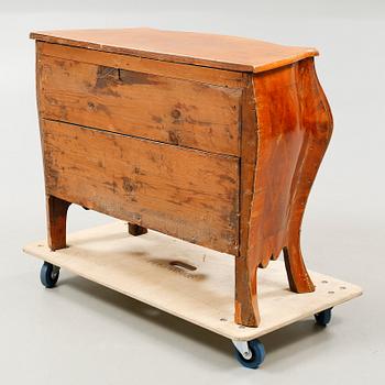 A Rococo bureau from the 18th century.