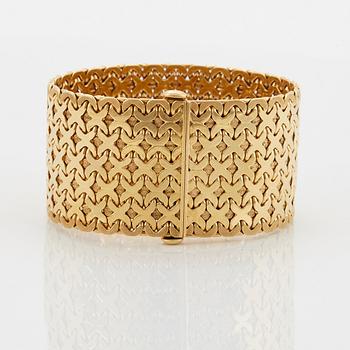 An 18K gold Tännler bracelet.