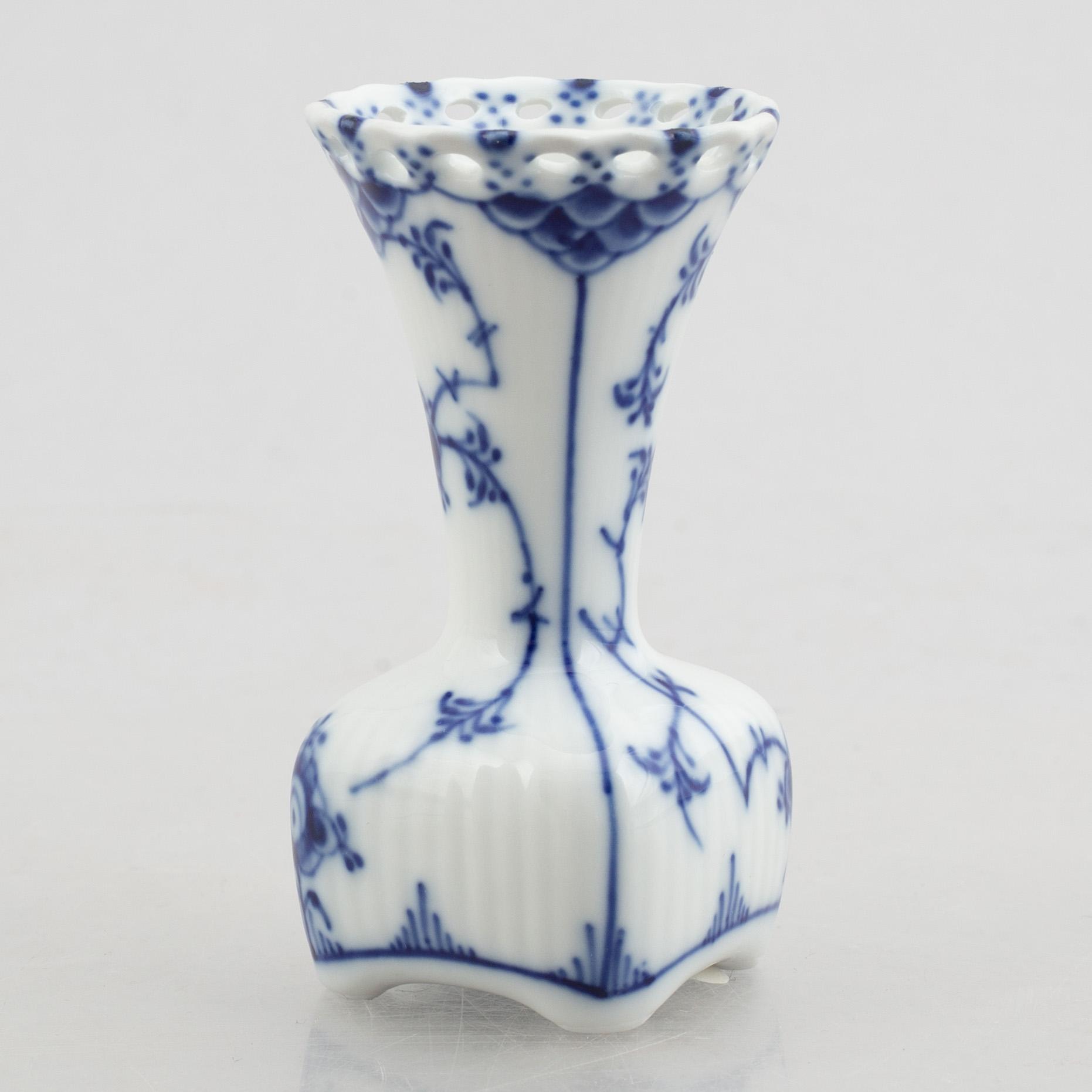 A group of two vases, two bowls and a candlestick, "Blue fluted full lace"/"Musselmalet", Royal Copenhagen.