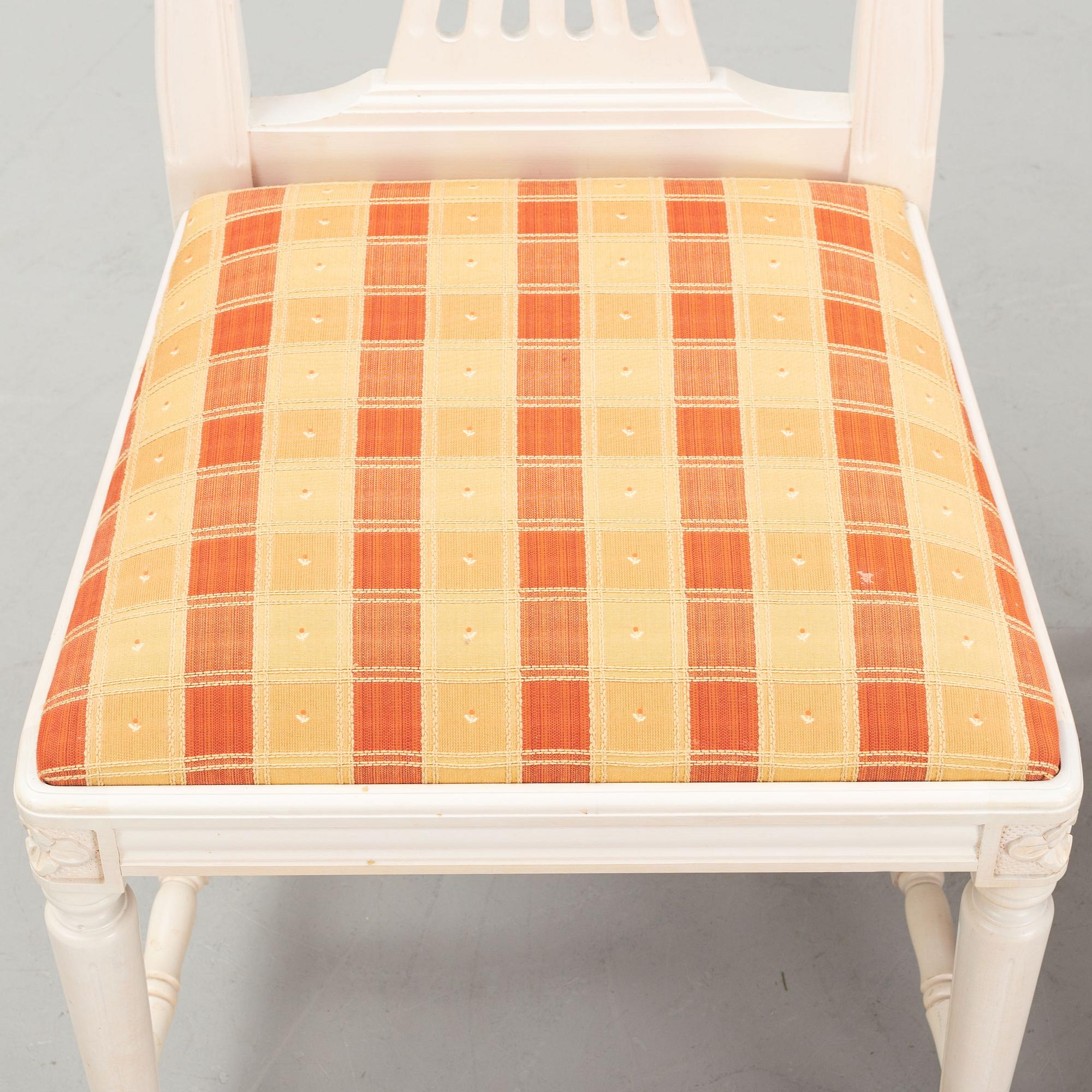 A dining table with eight chairs and a stool, Gustavian style, second half of the 20th Century.