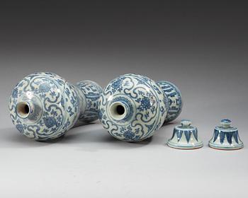 A pair of blue and white 'Meiping' vases with cover, Ming dynasty.