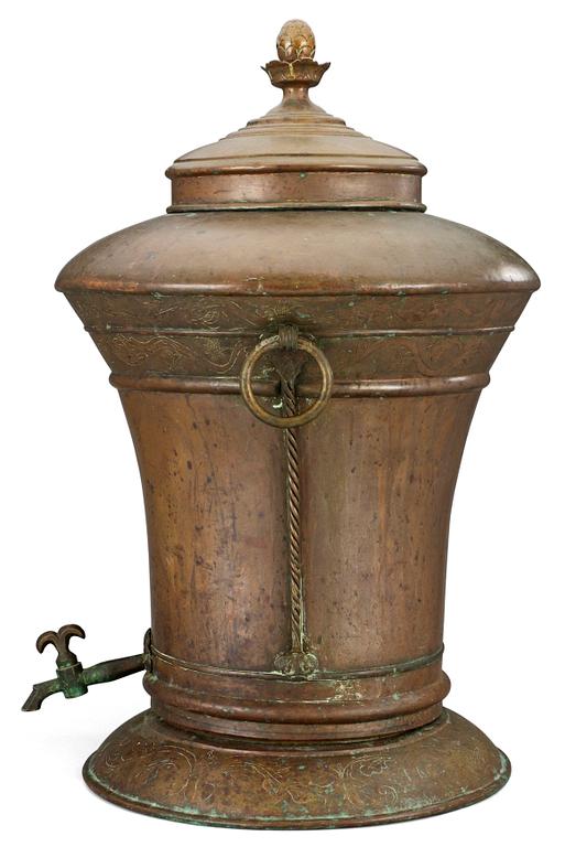 An 18th century copper cistern.