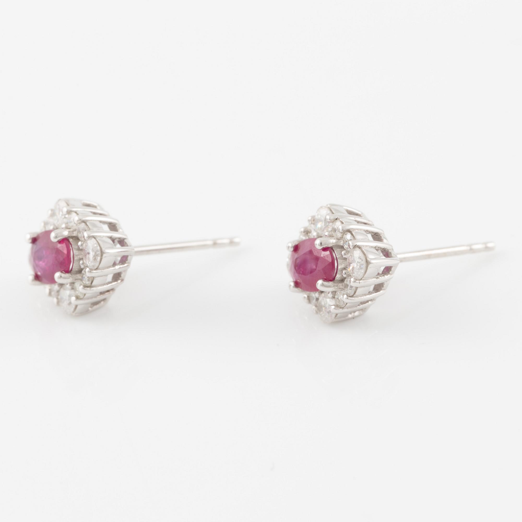 Earrings 18K white gold with rubies and brilliant-cut diamonds.