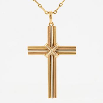 A Cartier necklace 18K multi-coloured gold "Trinity" cross.