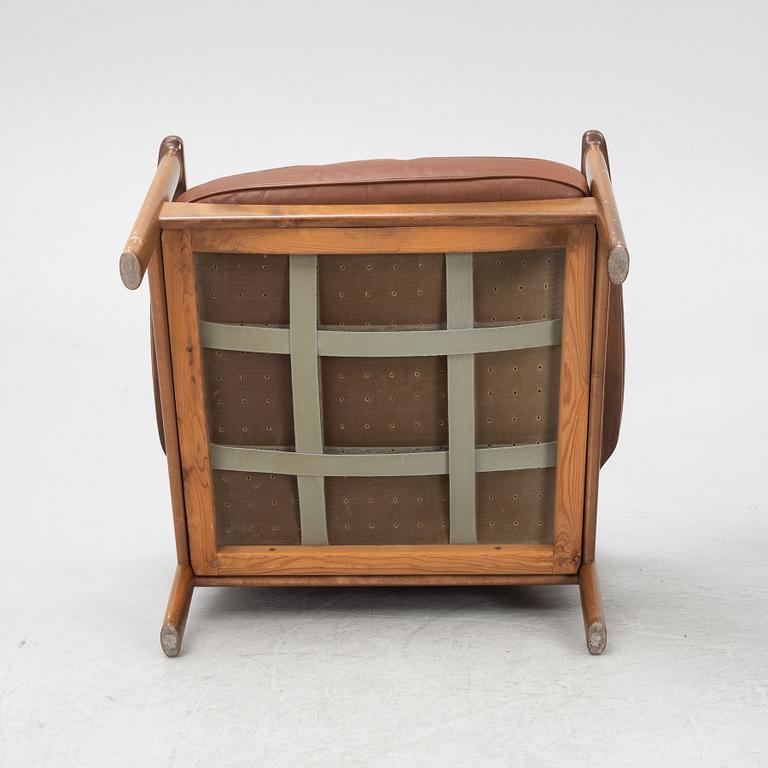 A pair of 1970's armchairs.