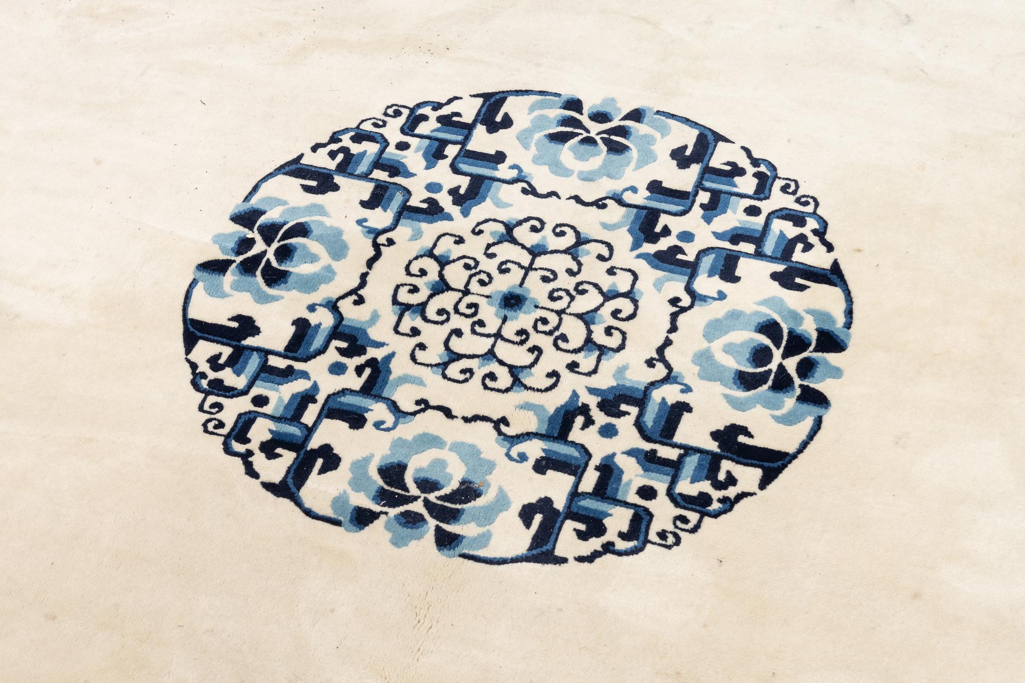 A semi-antique/old Chinese carpet, c 320 x 232 cm.