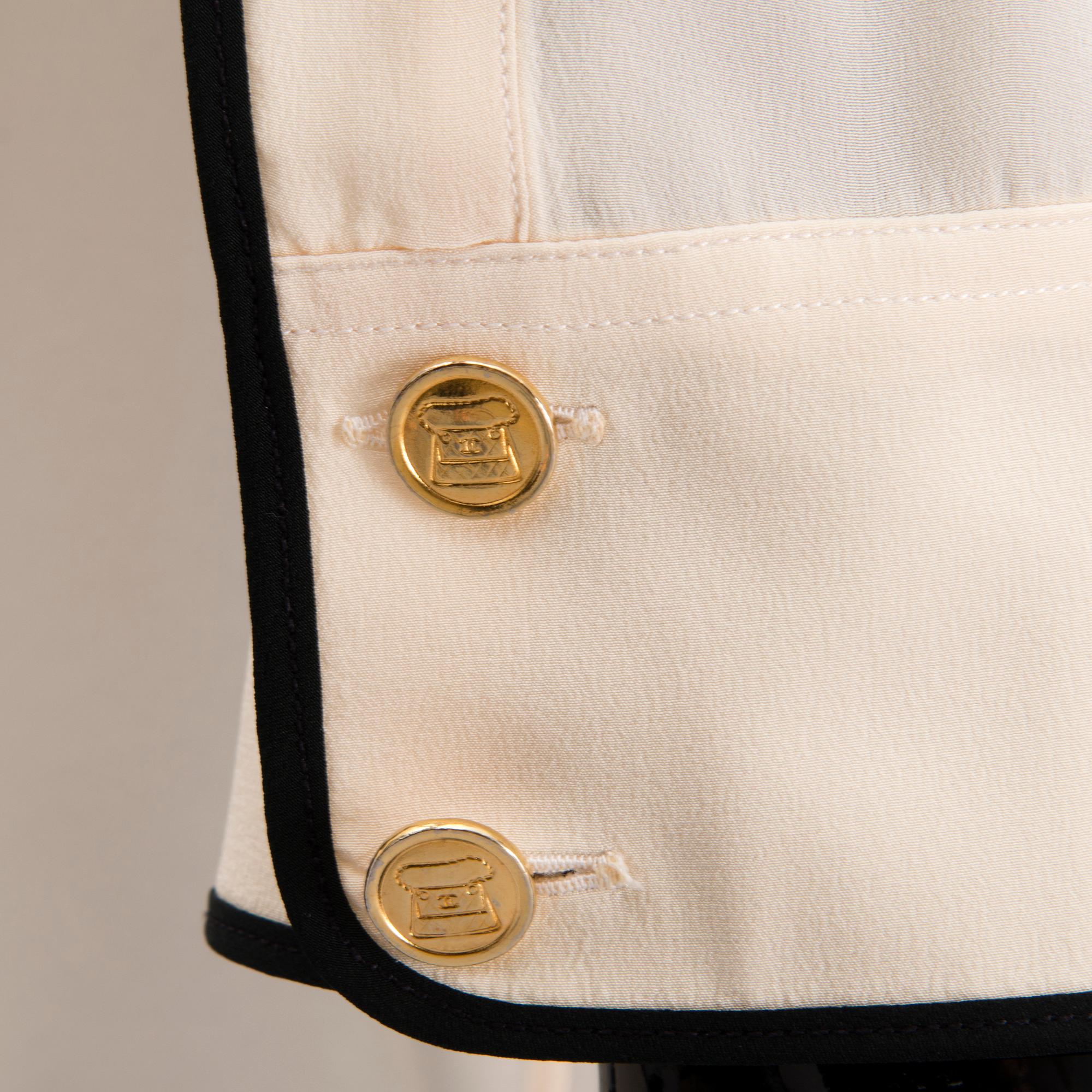 Two Chanel Crepe de Chine Cream Coloured Silk Blouses.
