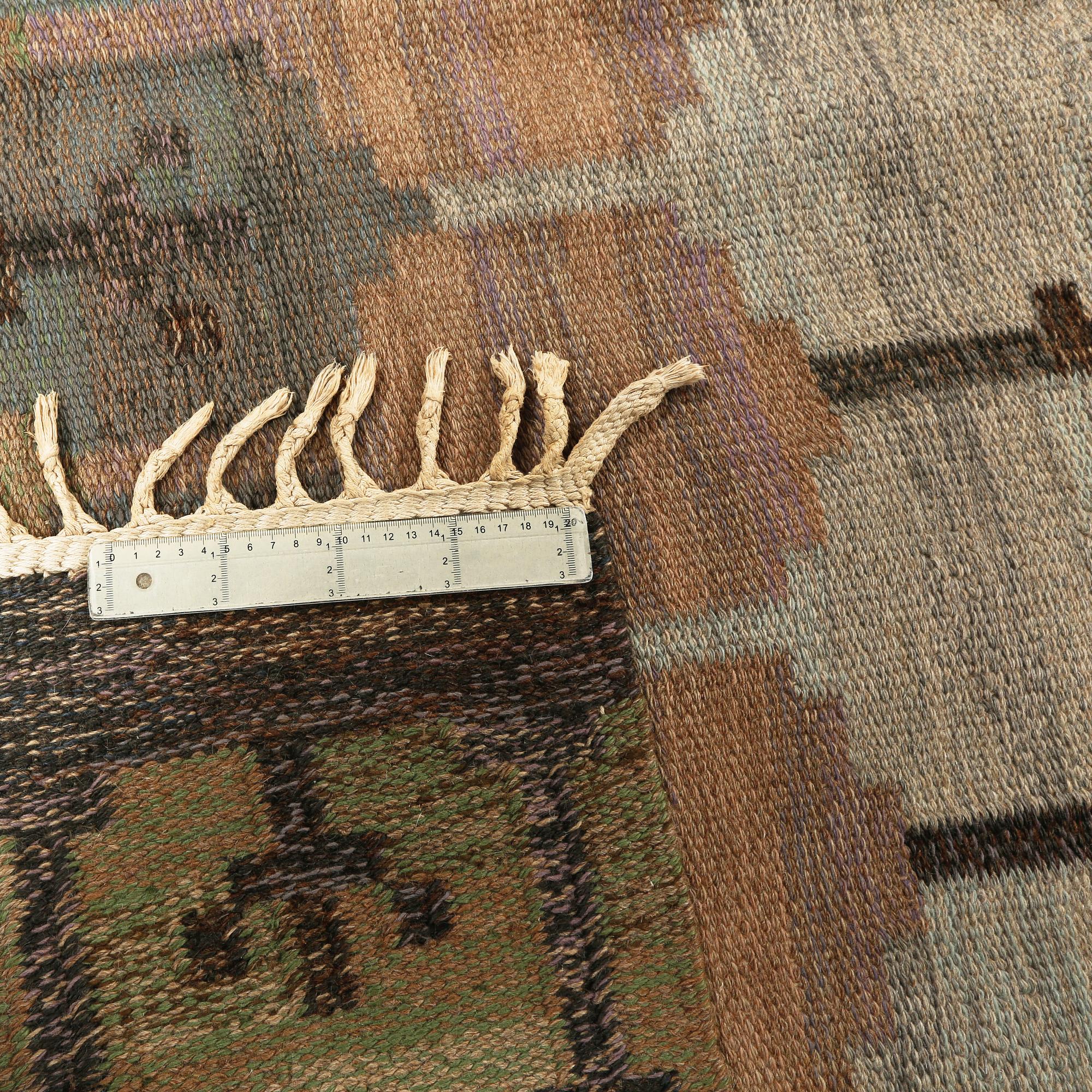 A flat weave by Judith Johansson, signed JJ, second half of the 20th century, 326 x 248 cm.