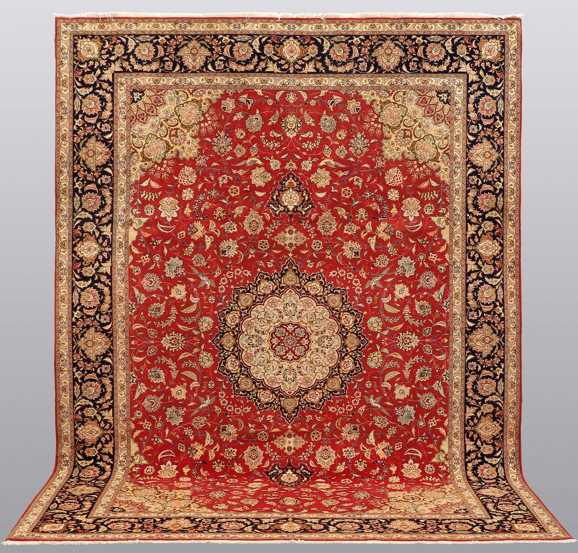 A carpet, Täbriz part silk, 341 x 248 cm.