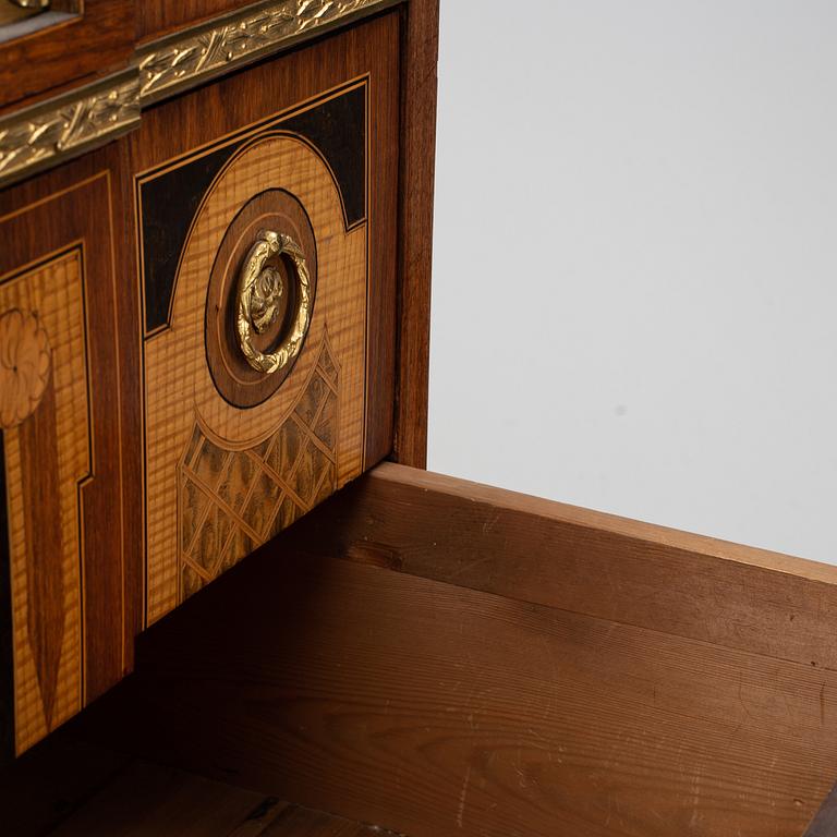 A late Gustavian style chest of drawers, from around the year 1900.