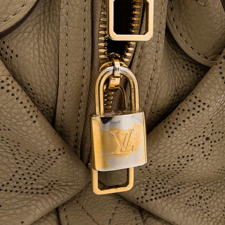 Louis Vuitton, a 'Mahina Galatea MM' bag.