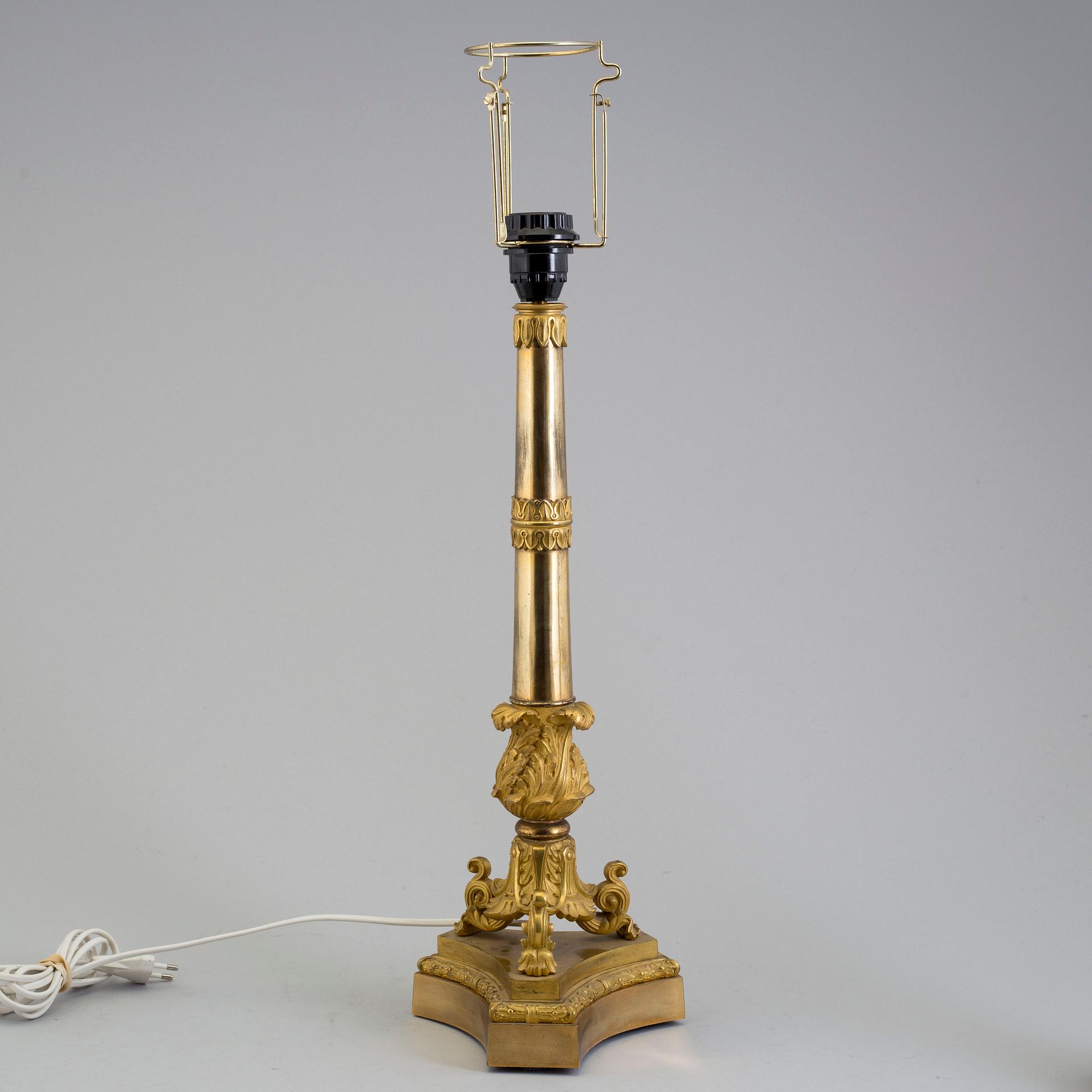 A LATE EMPIRE ORMOLU TABLE LAMP, mid 19th century.
