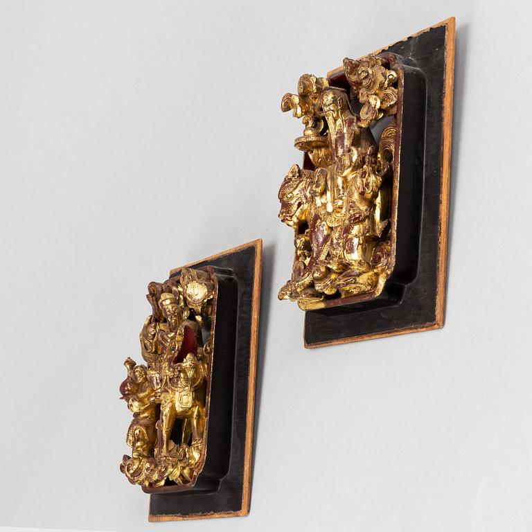 Two sculptured wooden panels, Qing dynasty, 19th Century.