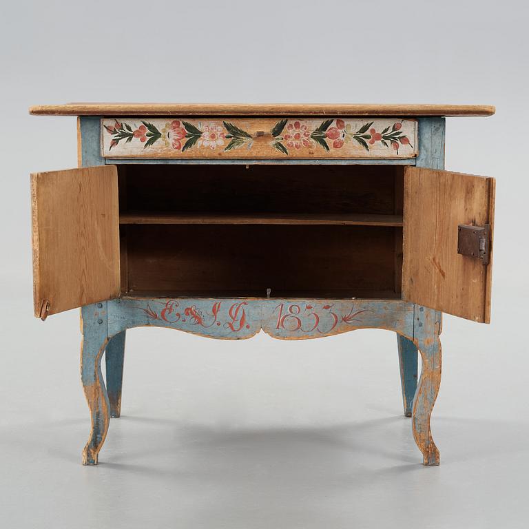 A painted pine table marked E.S.D 1833.