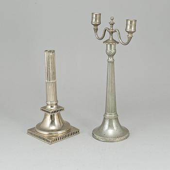 Two gustavian pewter candlesticks, one by Nicolaus Justelius, Eksjö 1806.