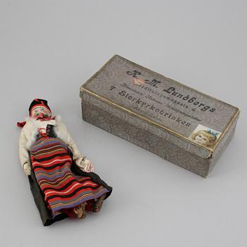 A circa 1900 bisque head doll.