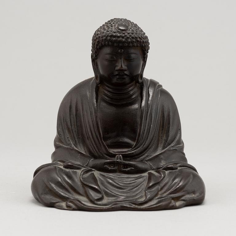 A Japanese seated bronze okimono of Amitabha buddha, 20th century.