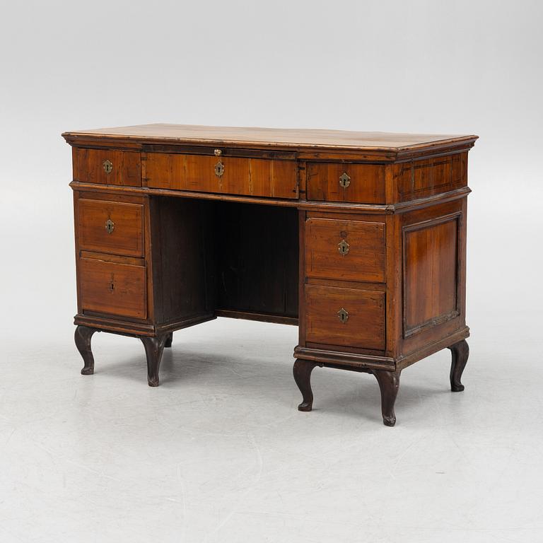 A Central-European 'kneehole' desk, 19th century.