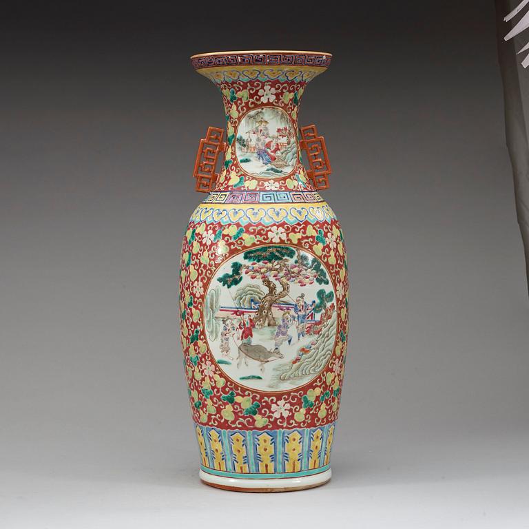 A large peach pink ground famille rose vase, late Qing dynasty.