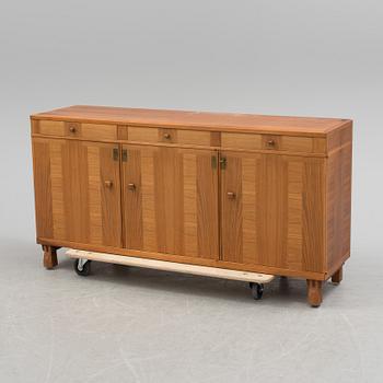 A Swedish second half of the 20th century Carl Malmsten "Ambassadör" sideboard veneered with walnut from Åfors möbler.