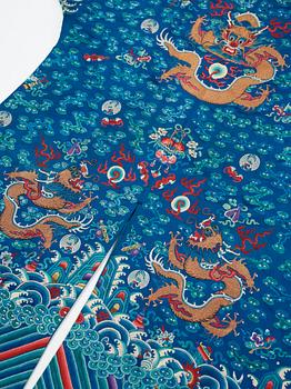 A Chinese embrodiered coat, late Qing dynasty, circa 1900.