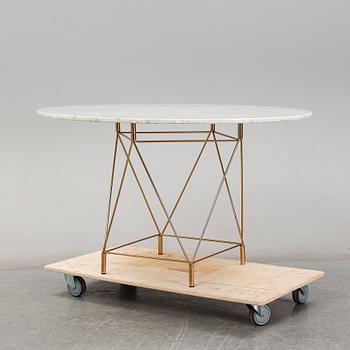 A 'Spider' dining table by Andreas Hansen for Eilersen.