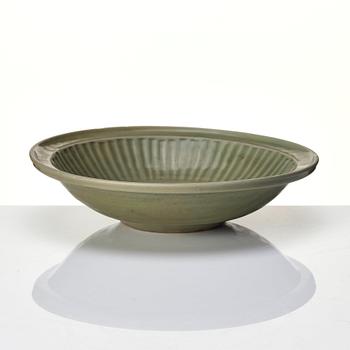 A large celadon glazed dish, Ming dynasty (1368-1644).