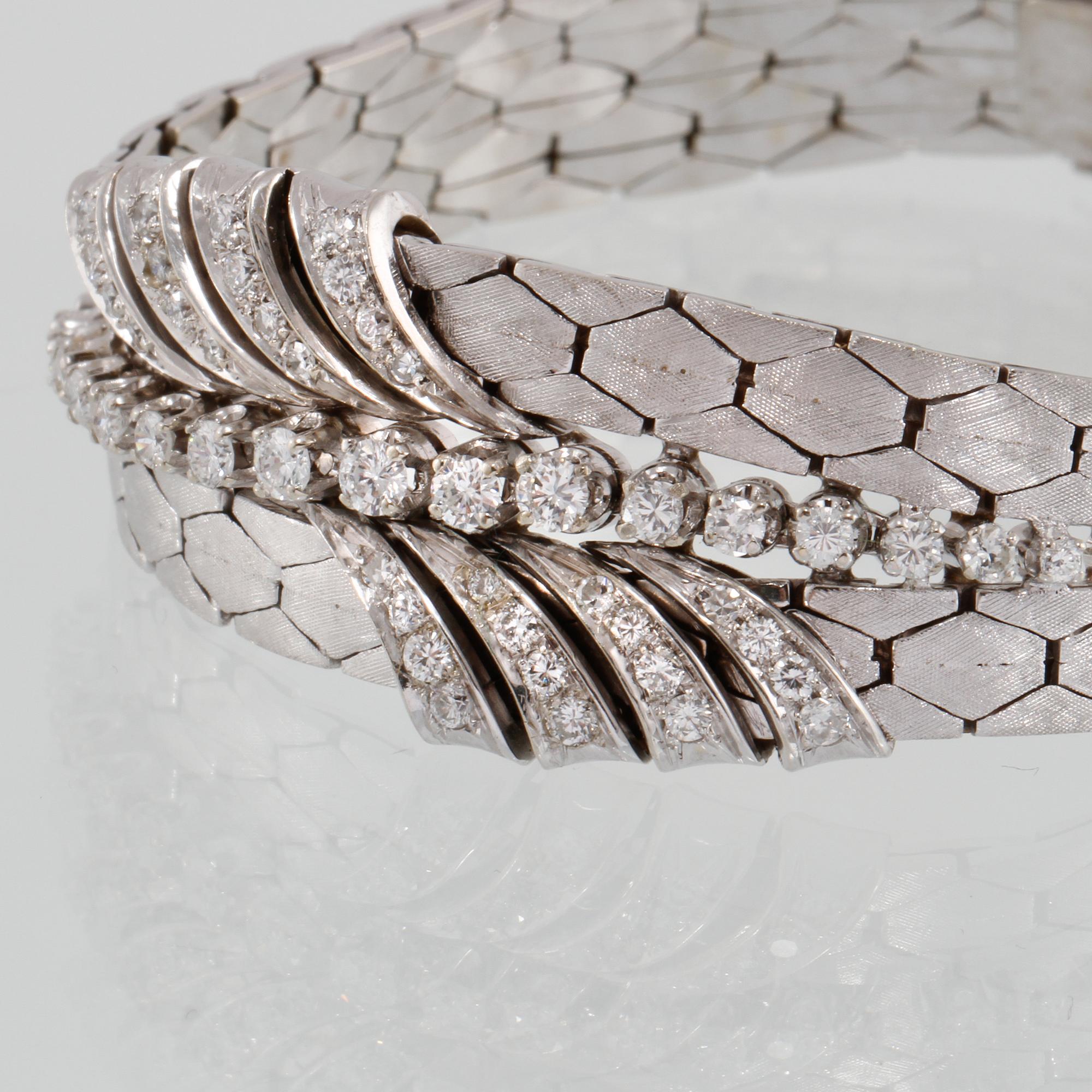 ARMBAND, 18K vitguld med briljant och åttkantslipade diamanter ca 1.30 ct. Vikt 54,5 gram.