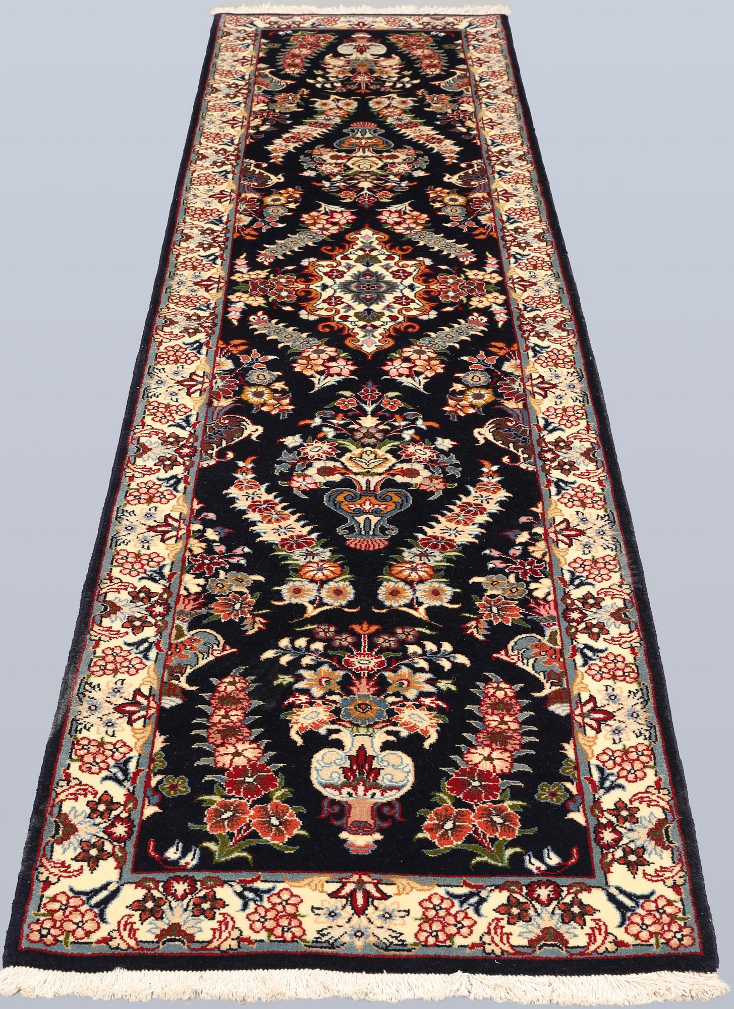 A Sarouk runner, approx. 310 x 72 cm.