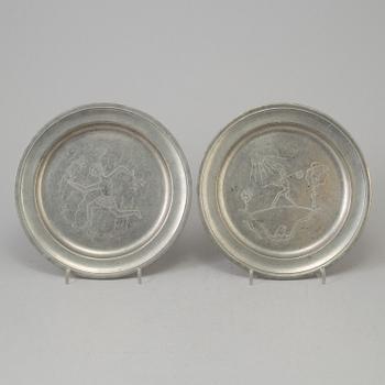 Two pewter Firma Svenskt Tenn plates from 1929.