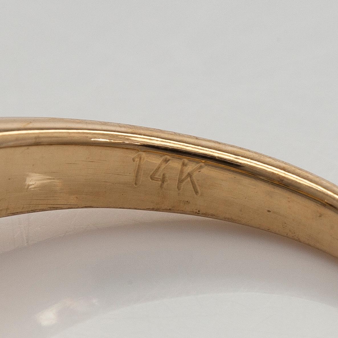 Sormus, markiisihiottu timantti, briljanttihiotut timantit, 14K kultaa.