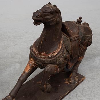 Two large wooden sculptures of horses, 20th century.