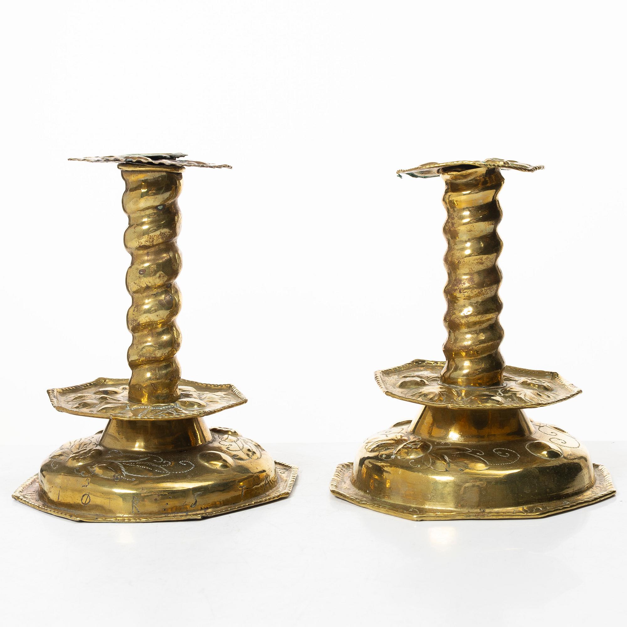 Two Baroque candle sticks, 18th Century.