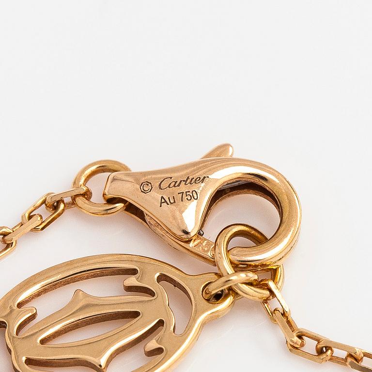 Cartier, necklace, D' amour 18K gold and pink sapphire.