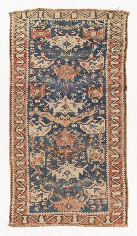 An oriental rug, c. 200 x 115 cm.