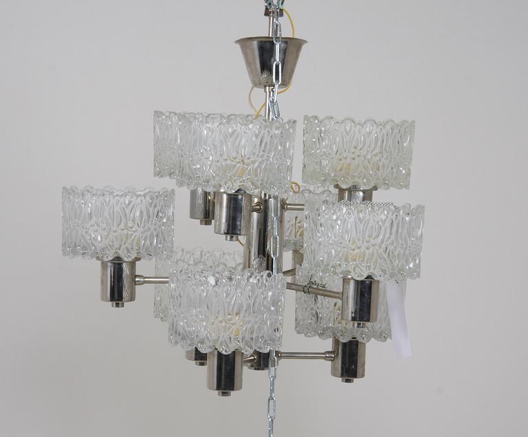 TAKARMATURER, ett par snarlika. H 52.