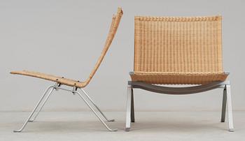 A pair of Poul Kjaerholm 'PK-22' steel and rattan easy chairs, Fritz Hansen, Denmark.