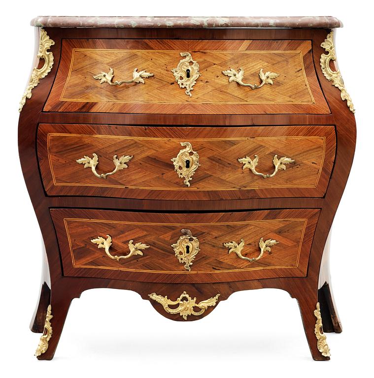 A Swedish Royal Rococo commode by G. Foltiern.