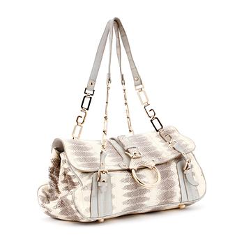 515. DOLCE GABBANA, a snakeskin embossed leather bag and matching shoes. Size 39.