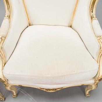 A pair of louis quinze style bergerer armchairs, first part of the 20th century.
