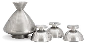 765. A Sylvia Stawe pewter vase and three candlesticks, CG Hallberg, Stockholm 1933.