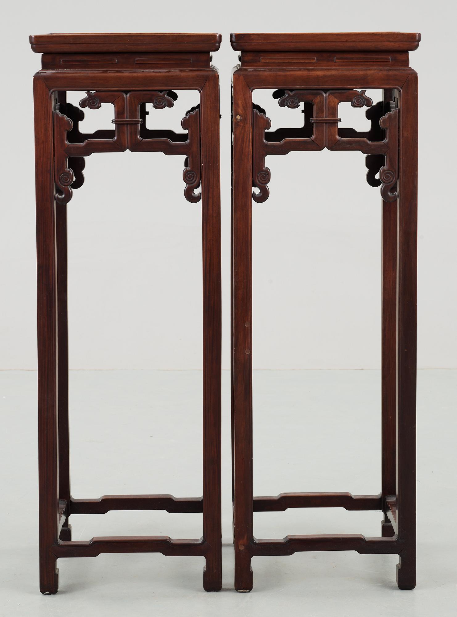 A set of two hardwood pedestals, presumably late Qing dynasty.