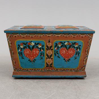 A painted pine chest from Dalsbo, Hälsingland, dated 1866.