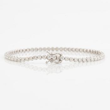 Tennis bracelet 18K white gold with brilliant-cut diamonds.