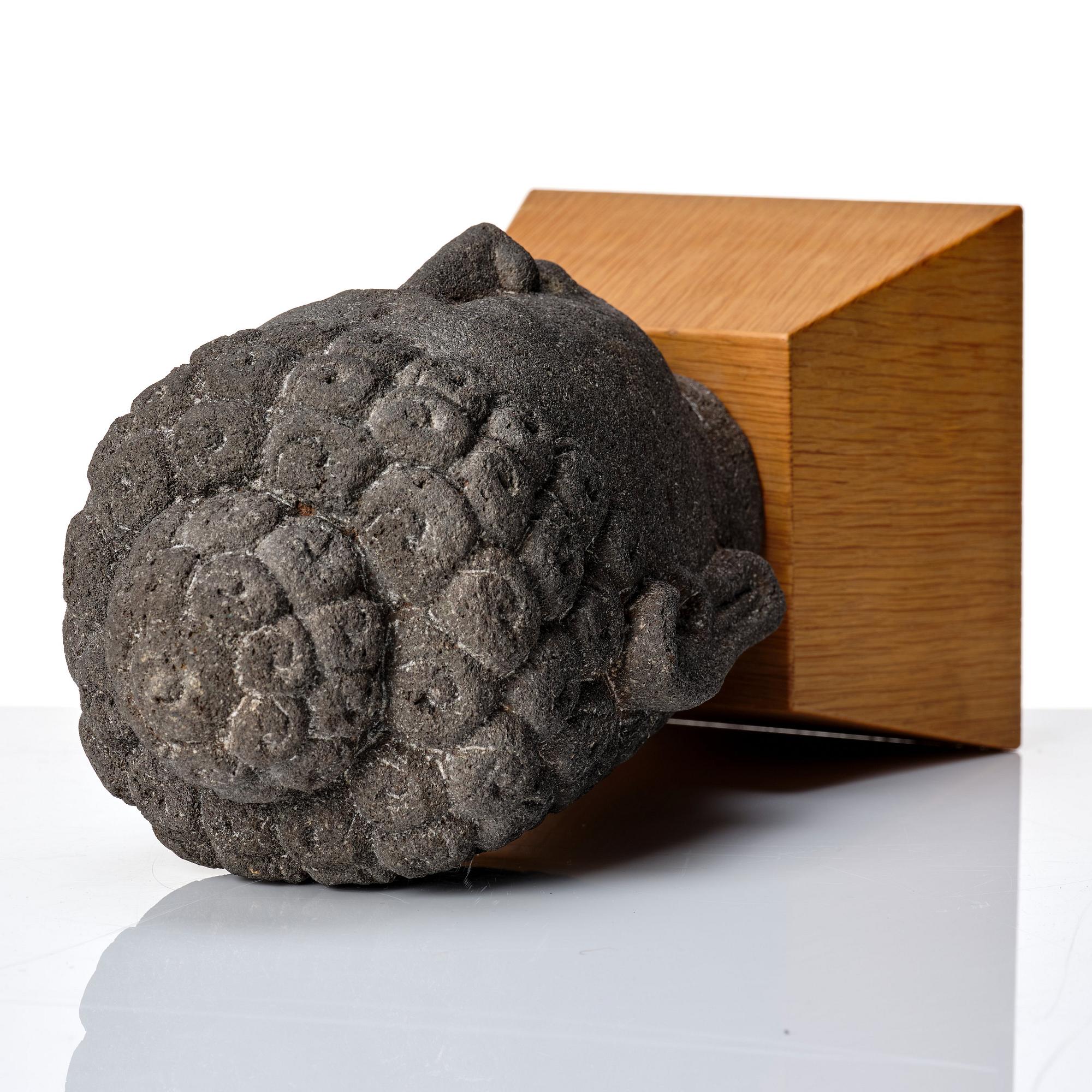 A Borobodur style Head of Buddha, Java.