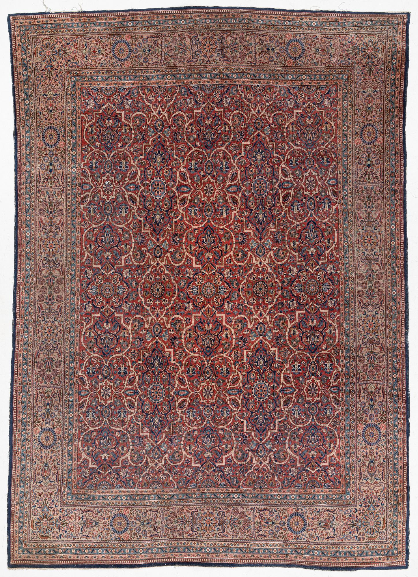 An oriental carpet, c. 425 x 305 cm.