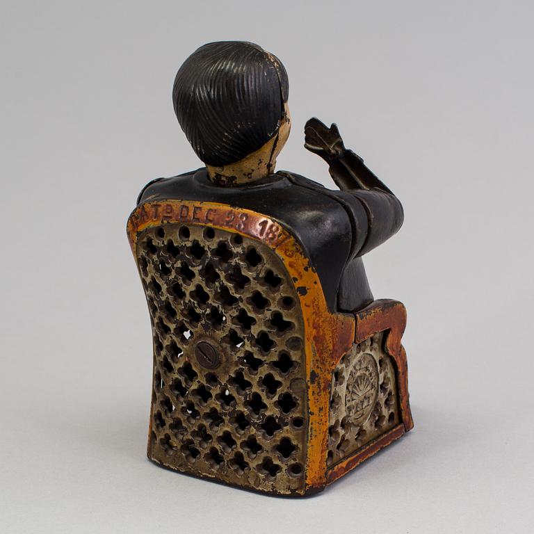 A Moneybox, cast iron, late 19th century.