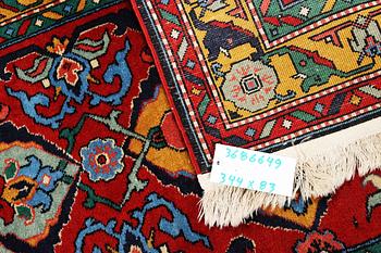 A Kazak runner carpet, c. 344 x 83 cm.