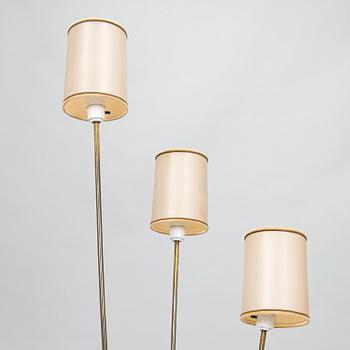 A mid-20th-century three-light floor lamp.